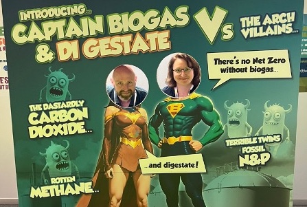 Richard Stevenson and Dr Erika Palfi as Captain Biogas and Di Gestate cardboard cutout logo